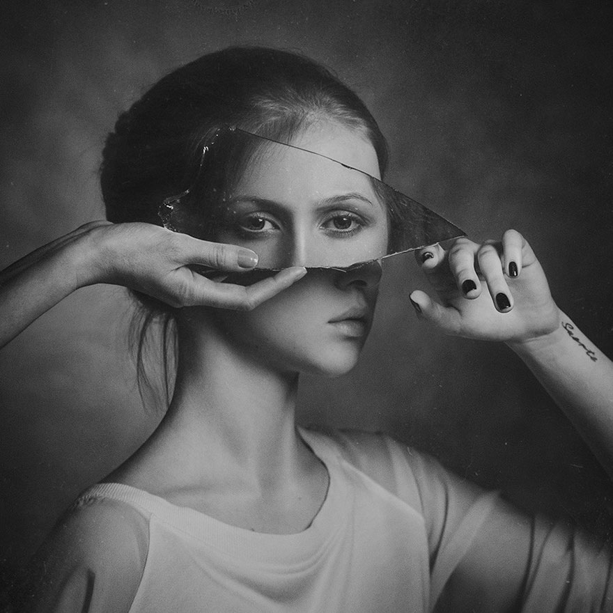 Surreal Self-Portrait With A Mirror Shard by paul apalkin